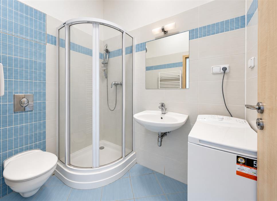 bright-modern-blue-tiled-bathroom.png